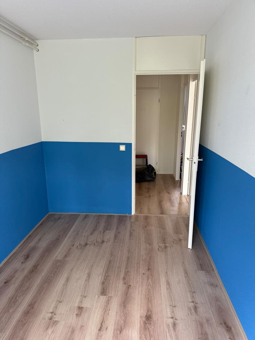Slaapkamer tweekleurig in wit en blauw
